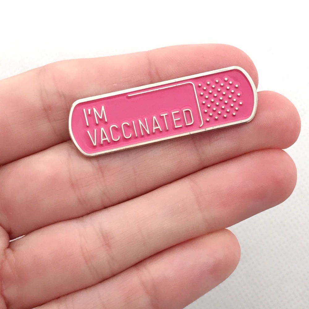 Silver bandaid pin